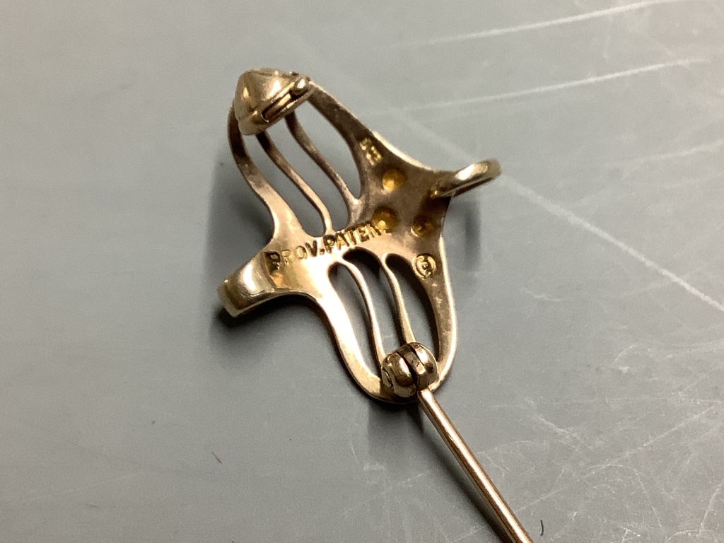 An early 20th century 9ct yellow gold brooch in the form of a stylised bird, by Murrle Bennett & Co, 2.9g